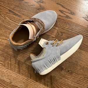 Esseutesse’s Suede Fringe Sneakers